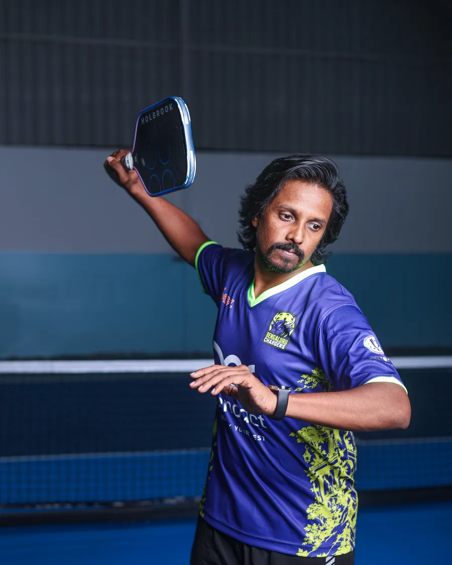 Captain Dinakar Naidu lining up an overhead